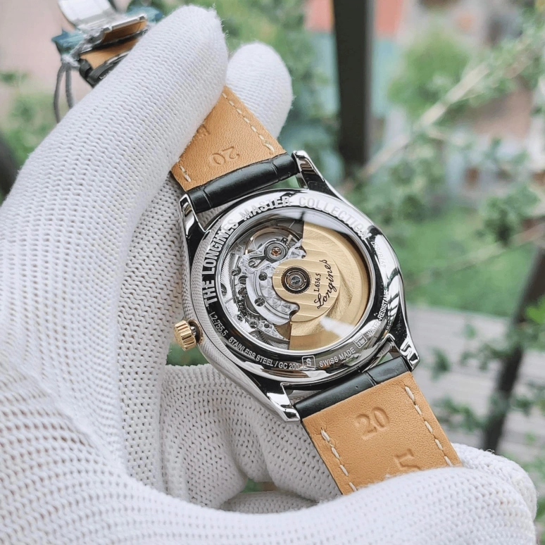 Longines,Master 38.50mm,38.50mm,Stainless Steel,Yellow Gold,Black,Automatic,Date,Day,L2,L2.755.5.57.2