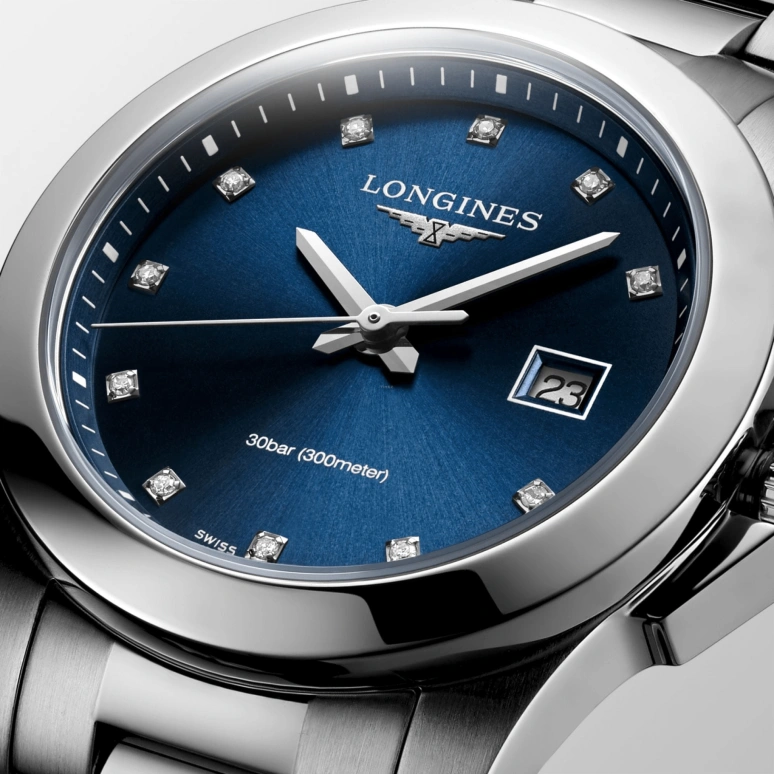 Longines,Conquest 29.50mm,29.50mm,Stainless Steel,Blue,Quartz,Day,26280hours,L3,L3.376.4.97.6