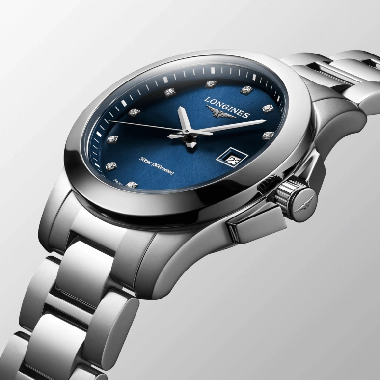 Longines,Conquest 29.50mm,29.50mm,Stainless Steel,Blue,Quartz,Day,26280hours,L3,L3.376.4.97.6