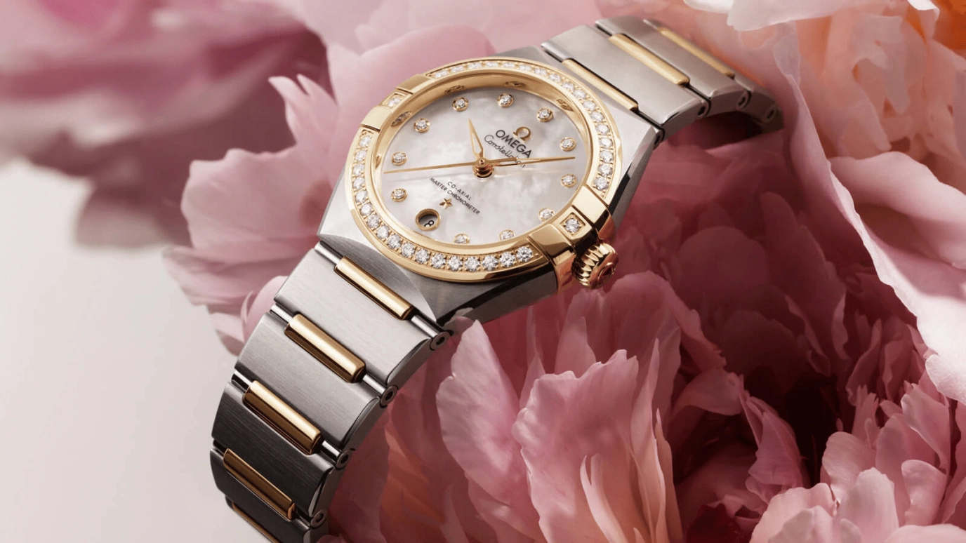 Omega,Constellation 29mm,29mm,Stainless Steel,Yellow Gold,White,Automatic,Date,Co-Axial Escapement,131,131.25.29.20.55.002