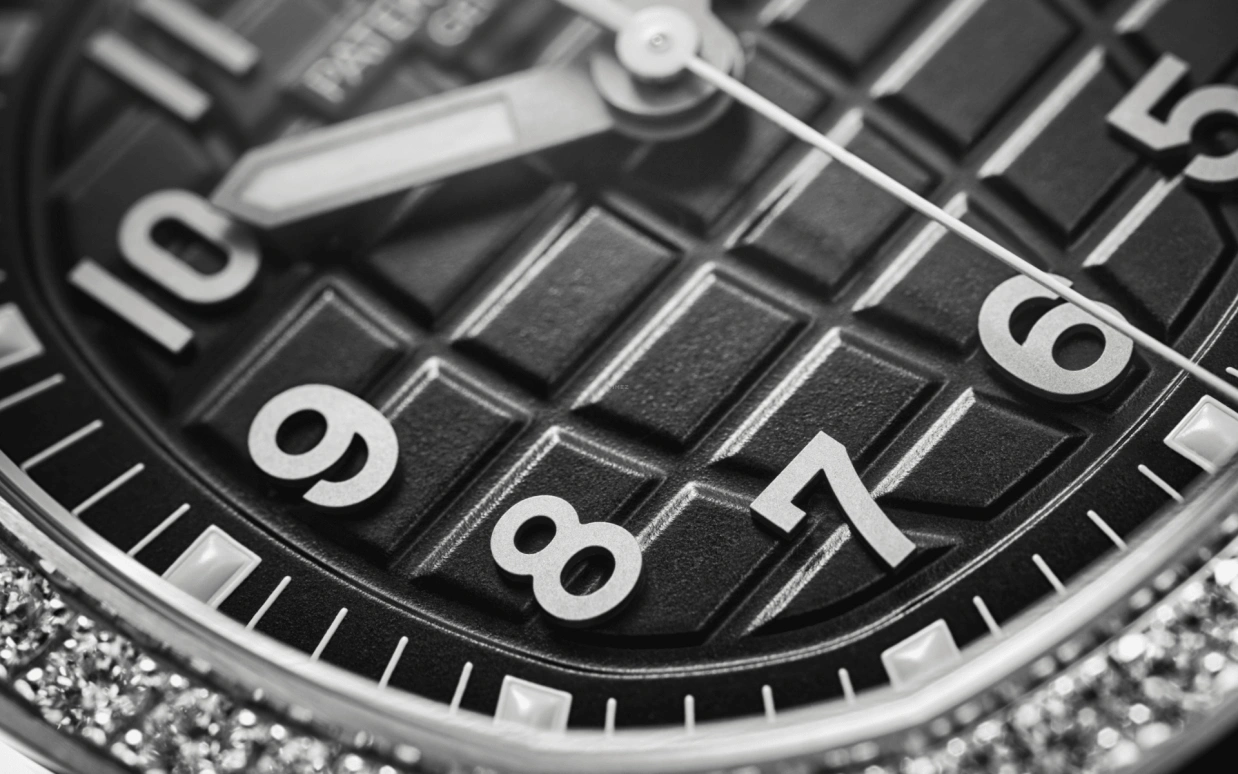 Patek Philippe,Aquanaut 38.80mm,38.80mm,Stainless Steel,Black,Quartz,Day,In-house Caliber,Summer,5267,5267/200A-001