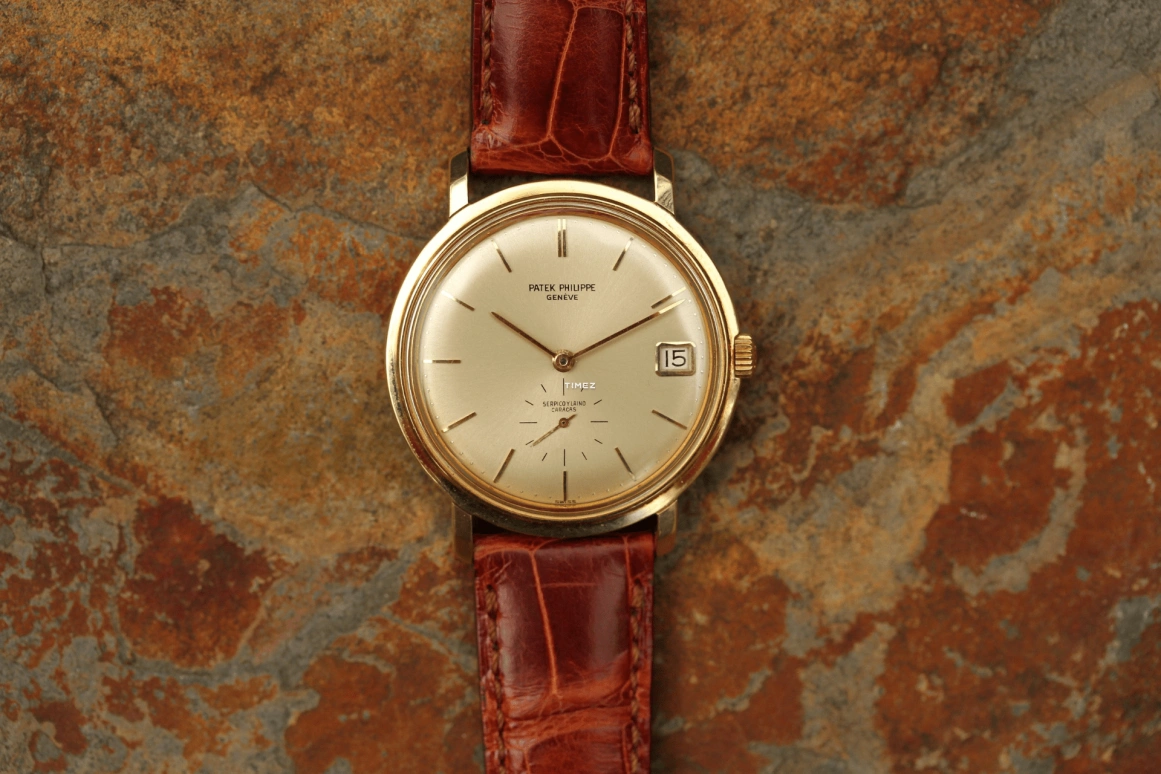 Patek Philippe,Aquanaut 35mm,35mm,Yellow Gold,Silver,Automatic,Day,38hours,3445J Serpico y Laino