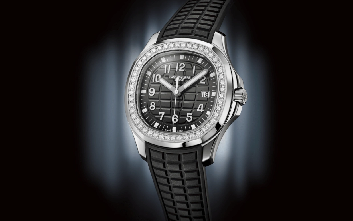 Patek Philippe,Aquanaut 38.80mm,38.80mm,Stainless Steel,Black,Quartz,Day,In-house Caliber,Summer,5267,5267/200A-001