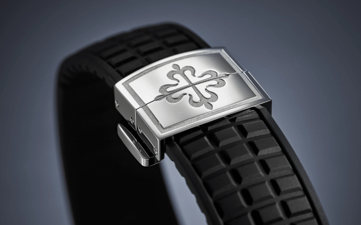 Patek Philippe,Aquanaut 38.80mm,38.80mm,Stainless Steel,Black,Quartz,Day,In-house Caliber,Summer,5267,5267/200A-001