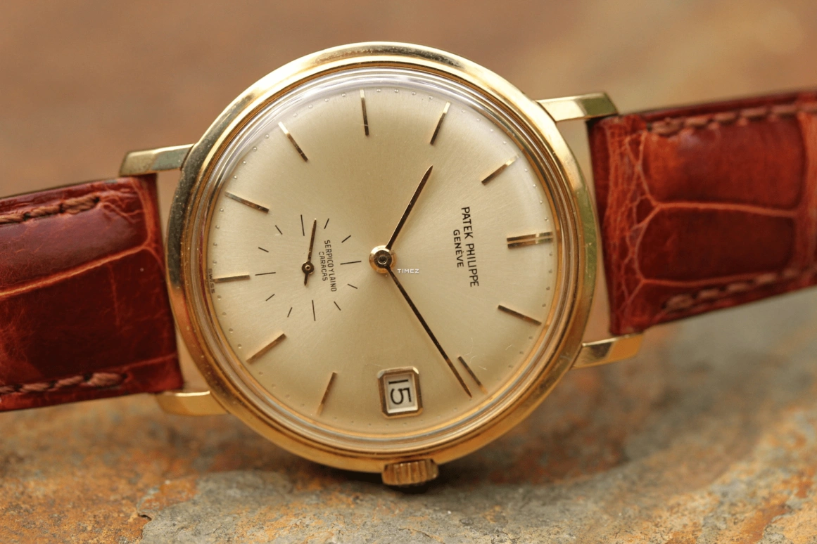 Patek Philippe,Aquanaut 35mm,35mm,Yellow Gold,Silver,Automatic,Day,38hours,3445J Serpico y Laino