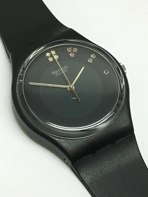 Swatch,Other 34mm,34mm,Plastic,Black,Quartz,Sapphire,Crystal Glass,Round,GB106