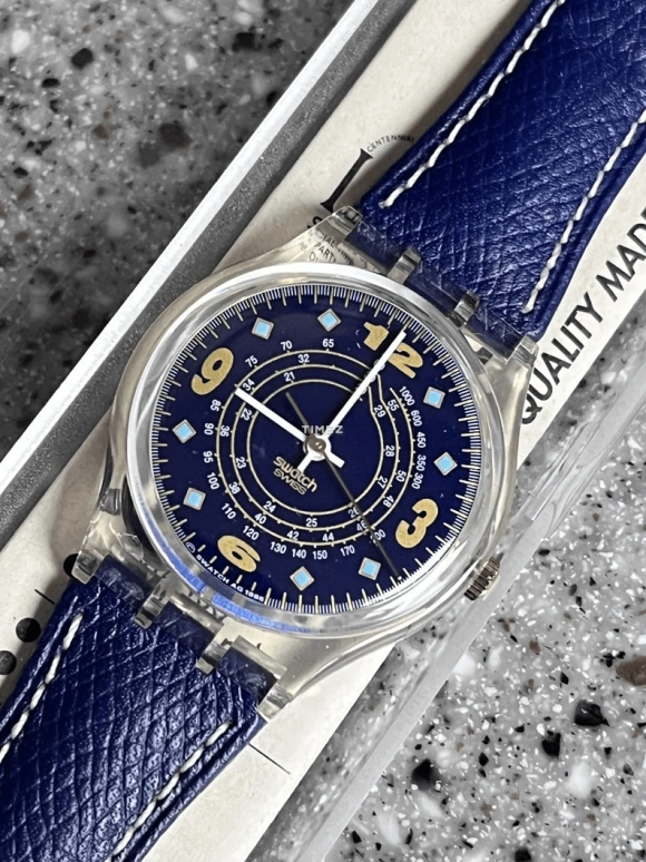 Swatch,Other 34mm,34mm,Plastic,Blue,Quartz,Sapphire,Crystal Glass,Tonneau,GK210