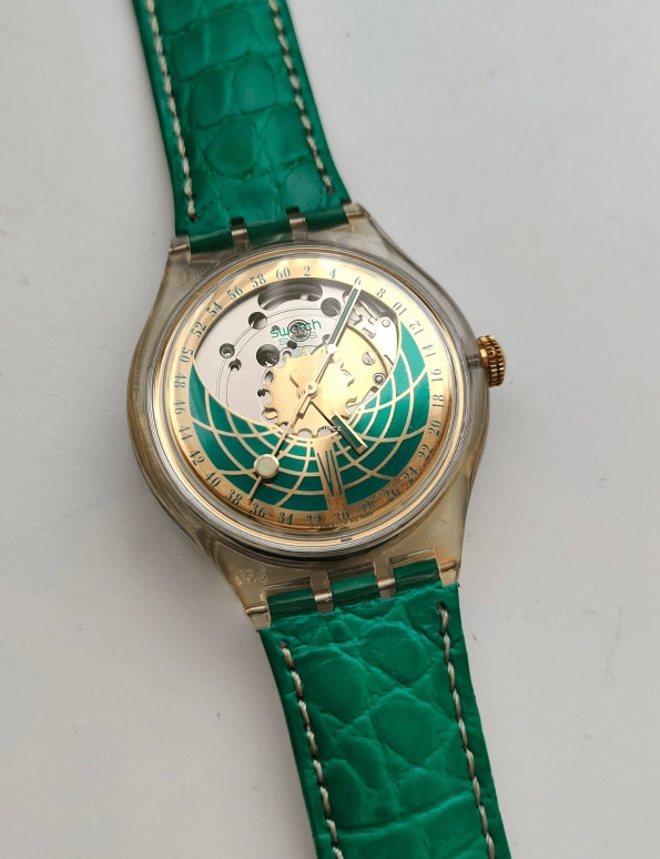 Swatch,Other 37mm,37mm,Plastic,Skeleton,Green,Automatic,Sapphire,Crystal Glass,Tonneau,SAK111